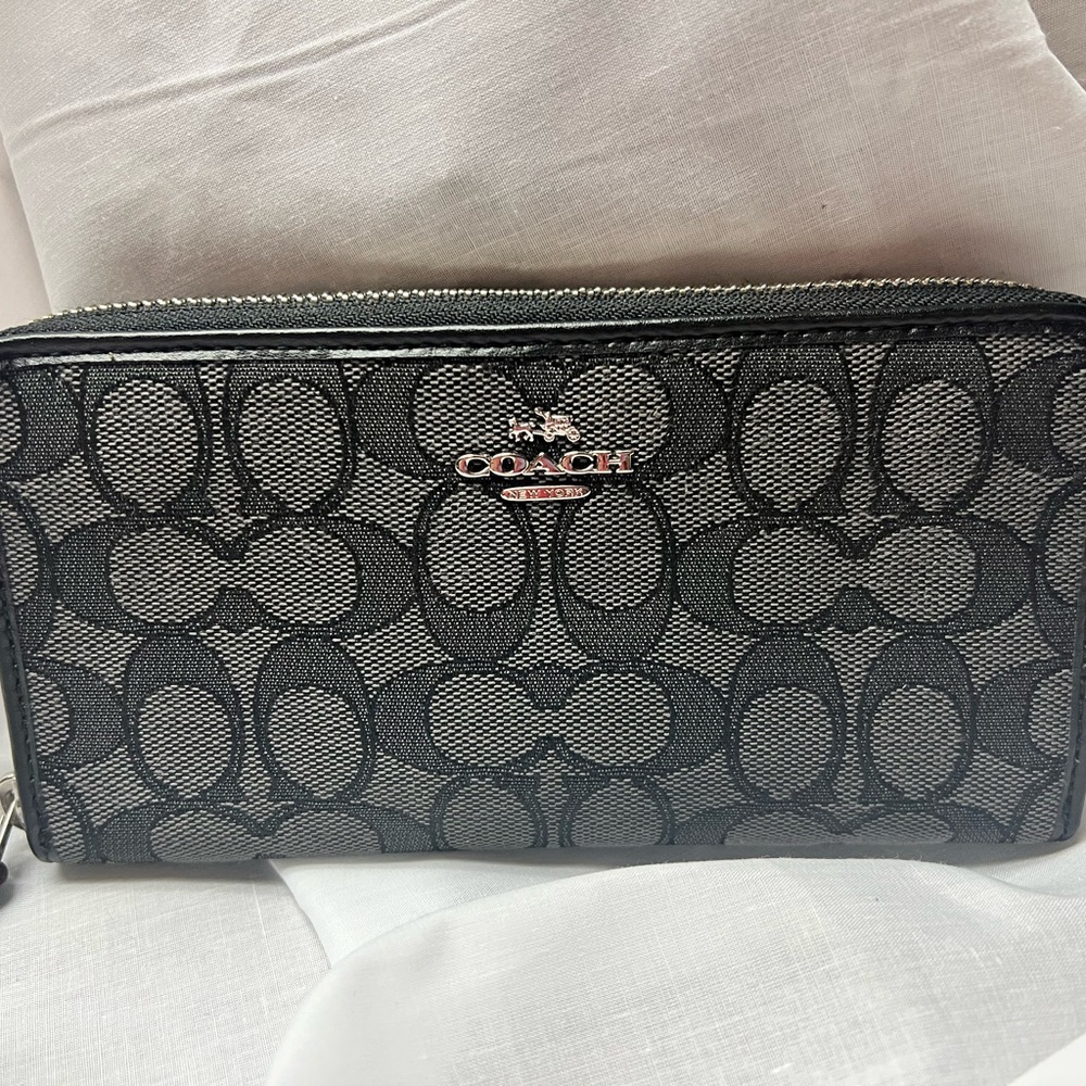 Black Coach Accordion zip wallet in signature canvas